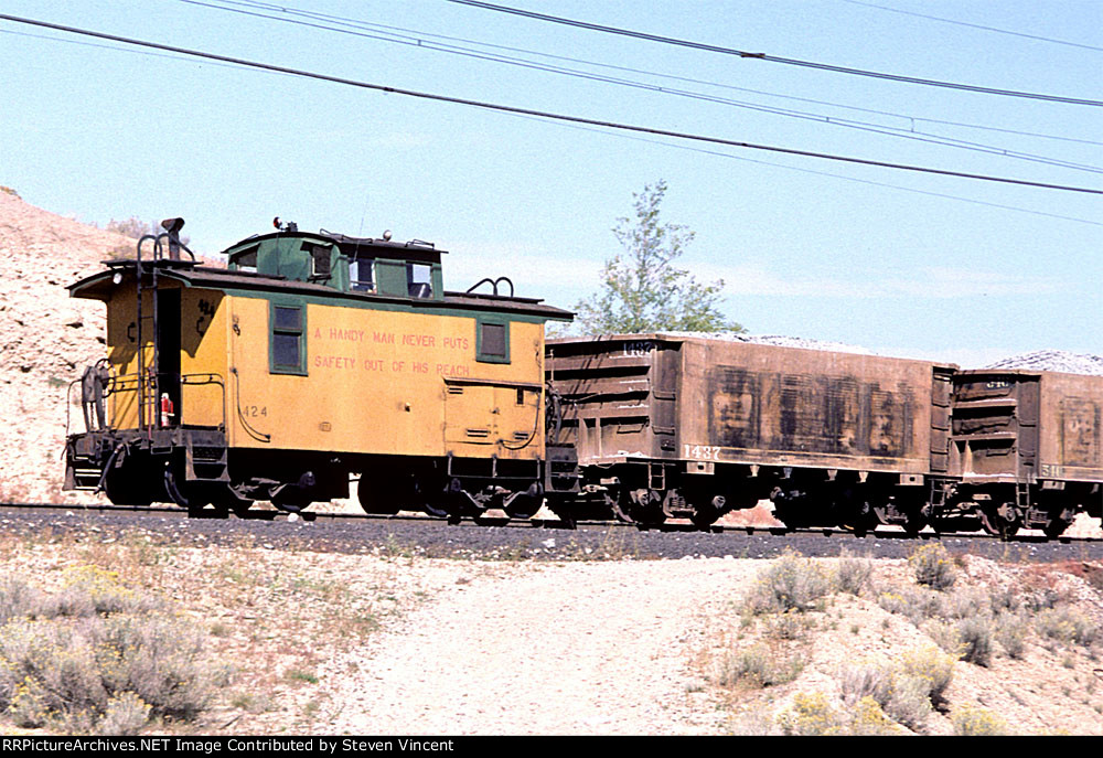 Kennecott Copper caboose KCC #424 on departing ore train to Magna